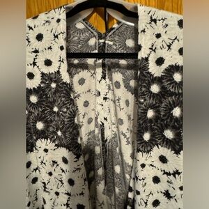 Not sure what the brand is, three XL kimono.